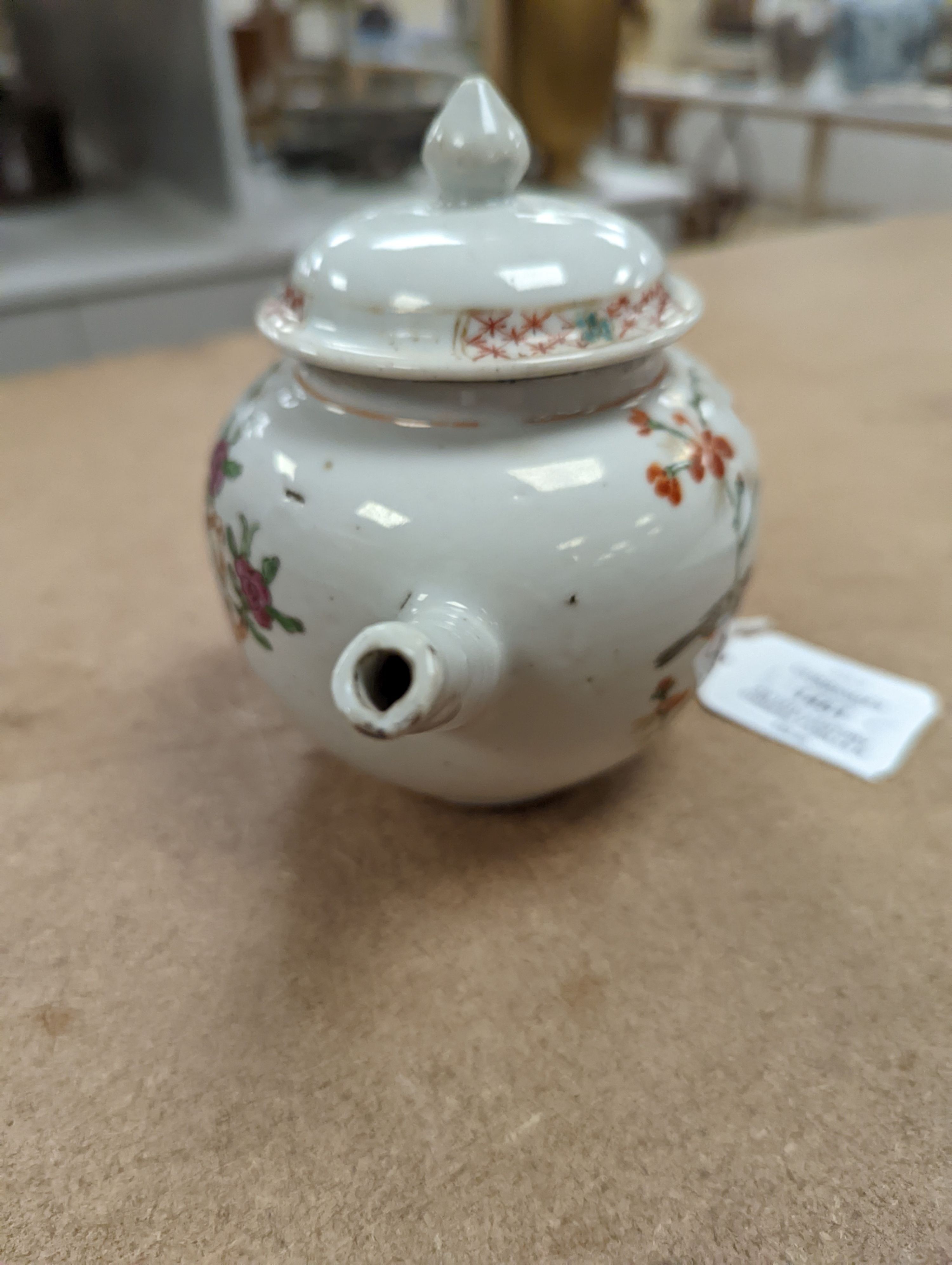 An 18th century Chinese famille rose teapot and associated cover 13cm